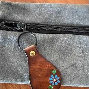 Beautiful vintage suede pocket book.  Suede is a little faded.  Great condition